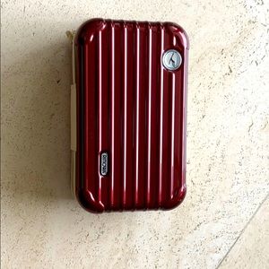 Rimowa Burgundy travel kit